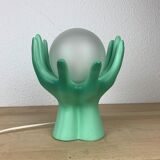Green ceramic hand lamp and glass globe