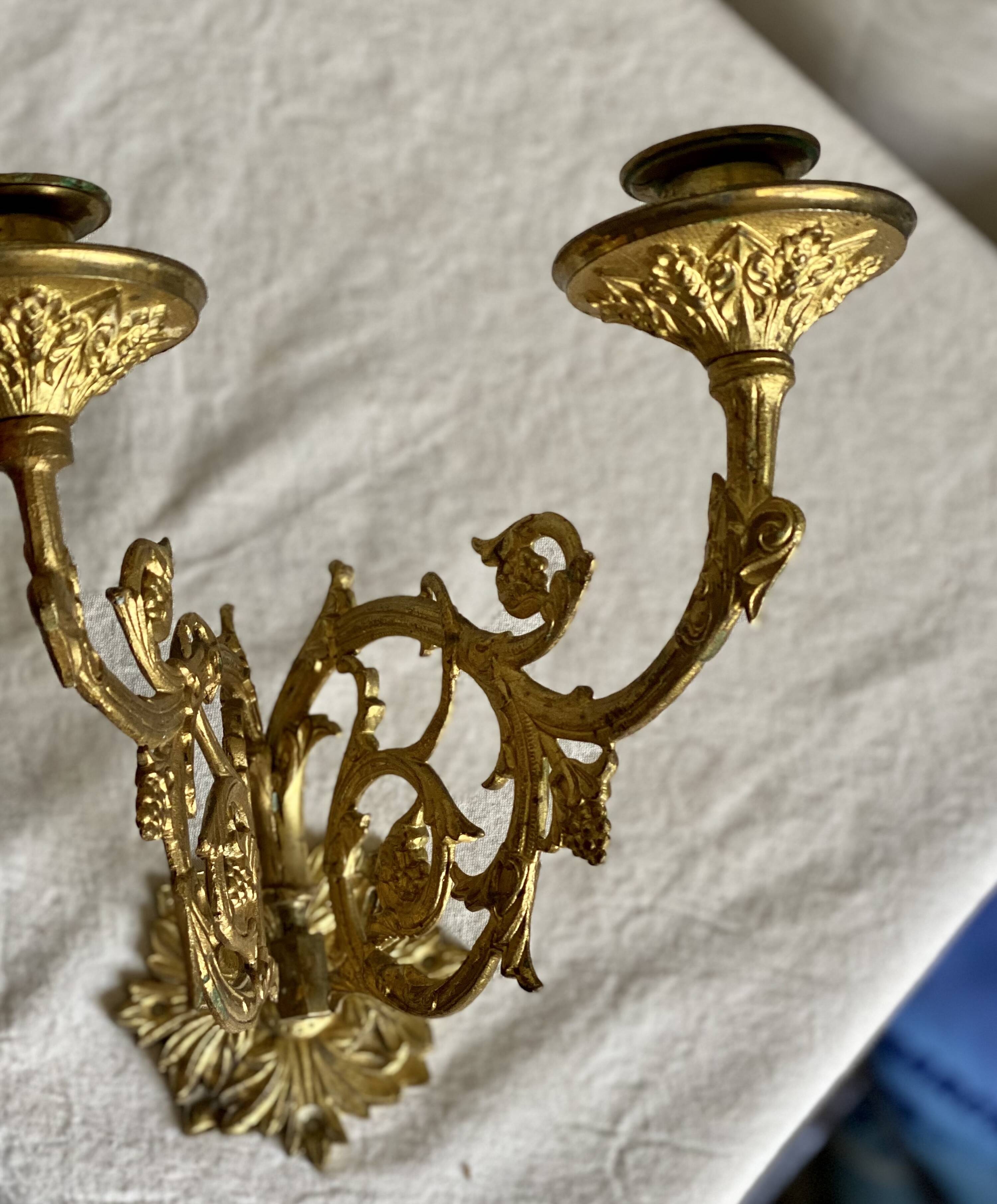 Pair of gilt bronze wall candlesticks