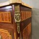 Louis XVI commode from the late 19th century.
