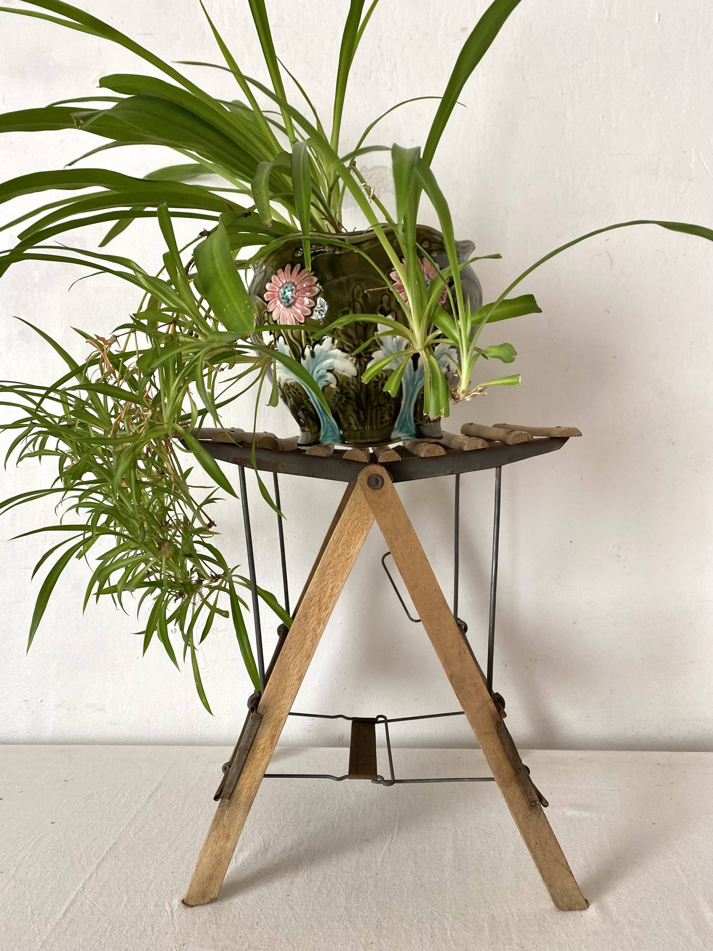 Antique folding stool with slats, plant holder