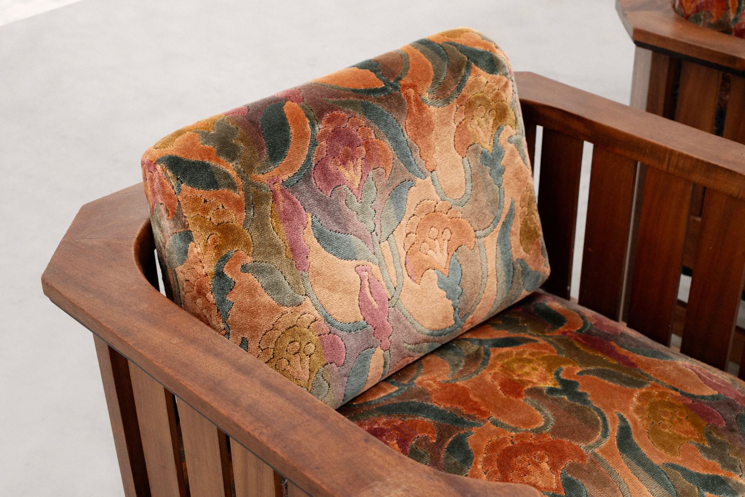 Pair of Amsterdam School walnut armchairs, Netherlands, c. 1930