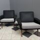 set of two black and white arm chairs 1960s