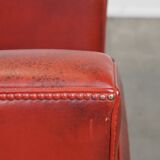 Set of 2 red-colored design armchairs made of sheepskin leather