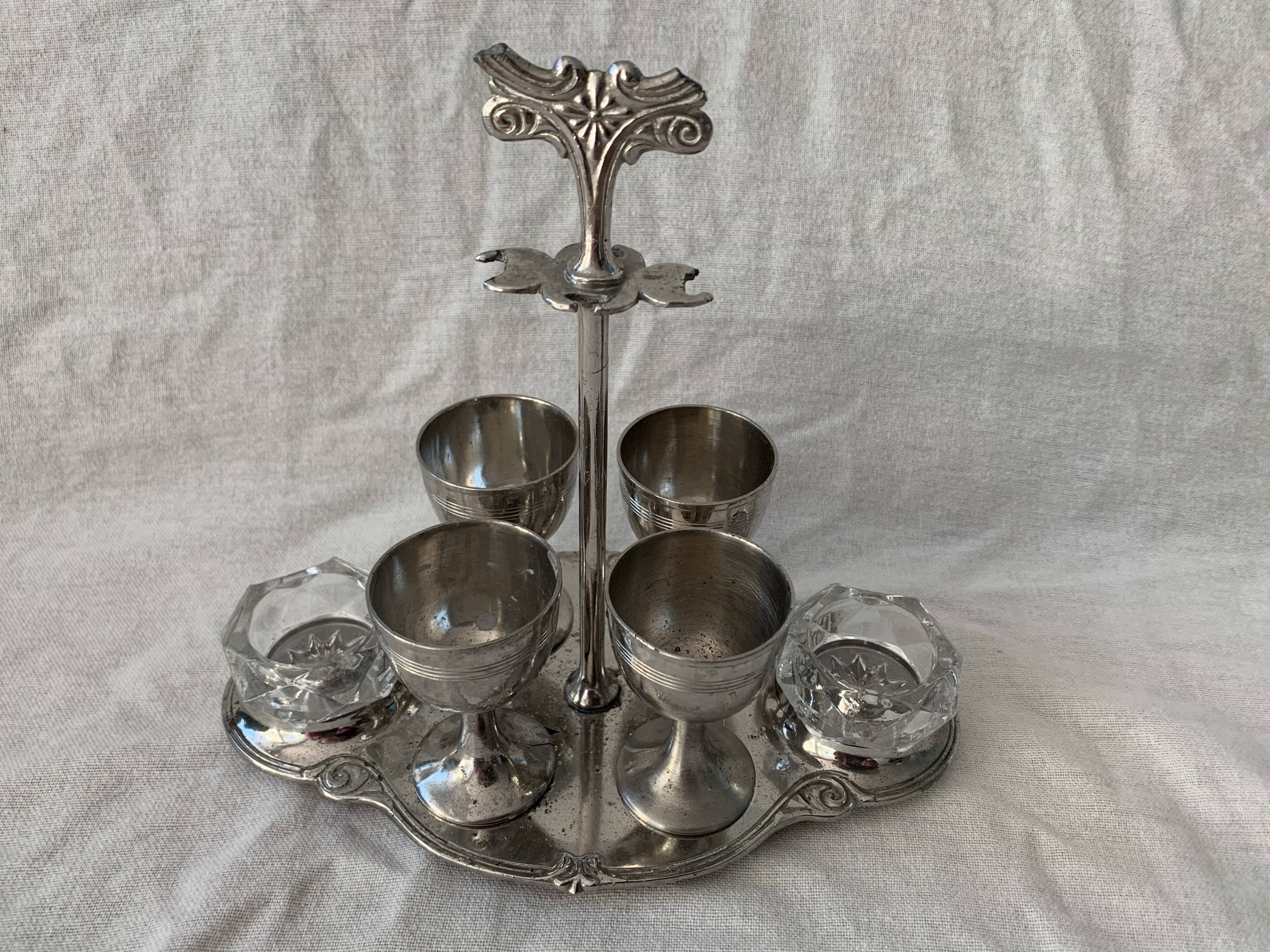 Old serving for boiled eggs with 4 metal cockroaches