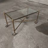 Rolling coffee table in vintage gilded bronze