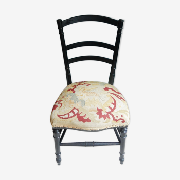 Black Napoleon III chair lined with phoenix