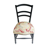 Black Napoleon III chair lined with phoenix