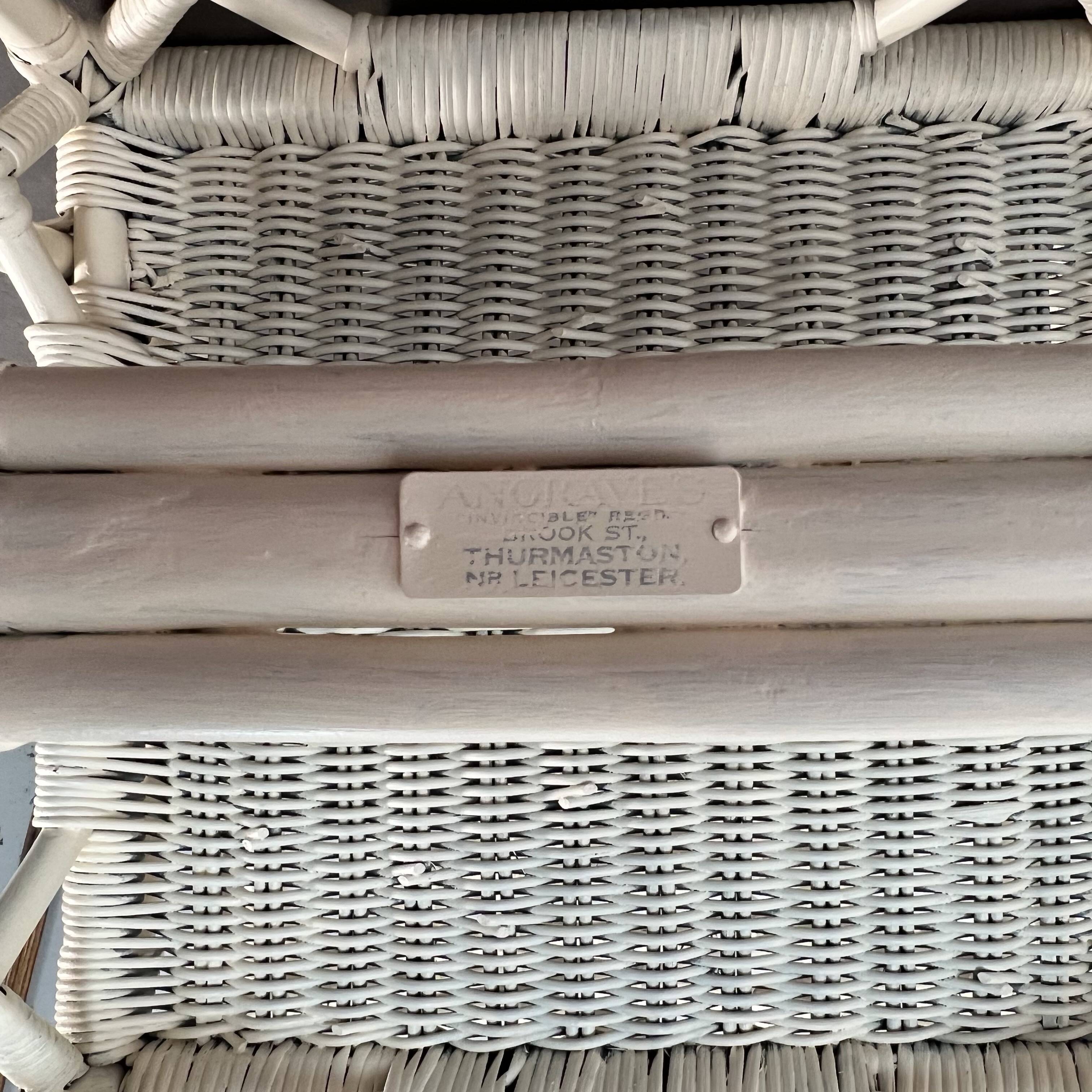 Pair of Angraves armchairs model Invincible in Chinese Chippendale style.