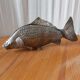 Poisson porte-serviette en métal argenté