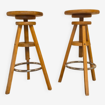Pair of vintage workshop stools with screws in wood and chrome