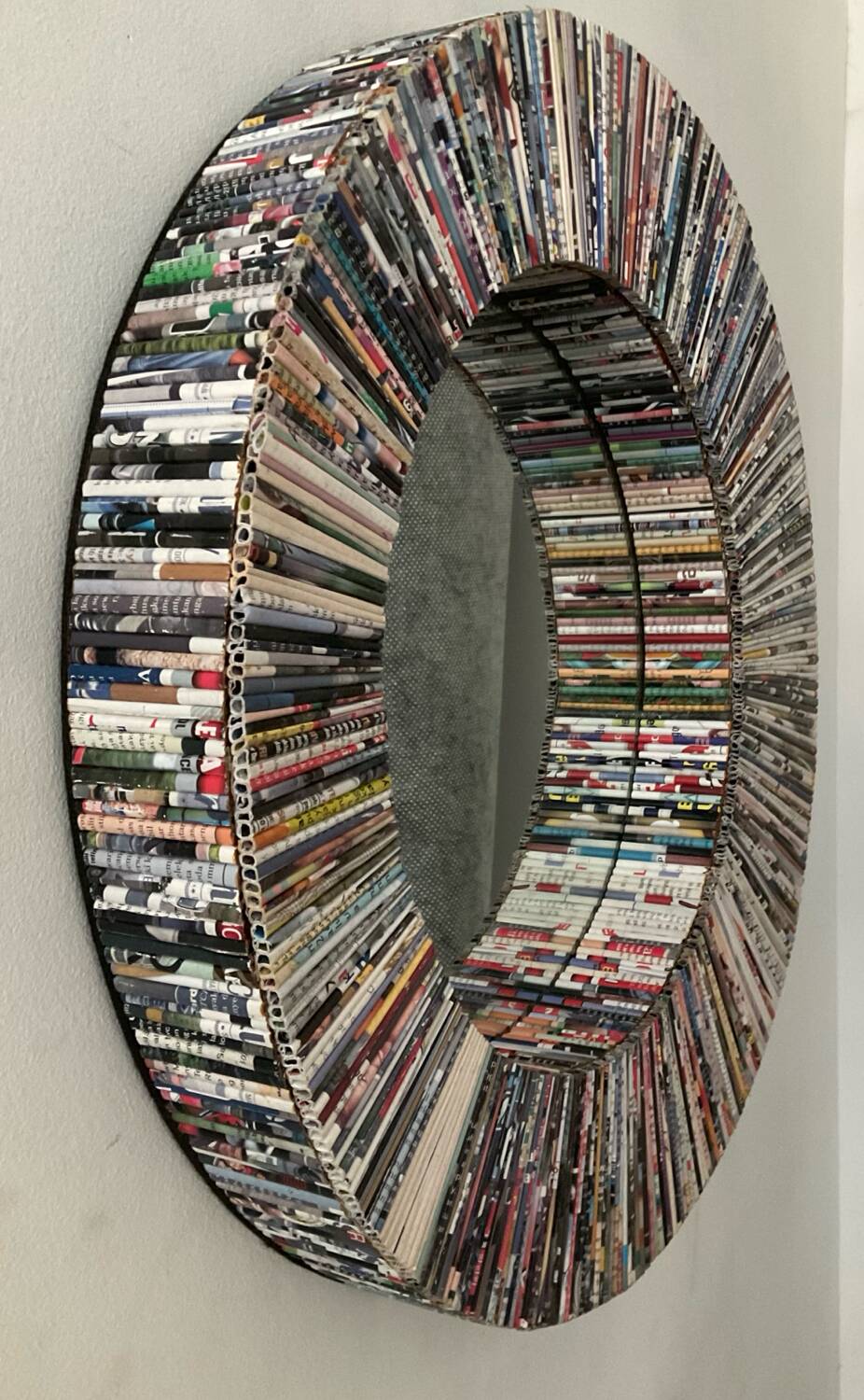 Vintage round mirror made of paper rolls