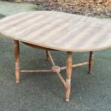 19th-century round extendable dining table with crossed legs, 115cm.