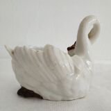 Mustard and salty swans, circa 1900