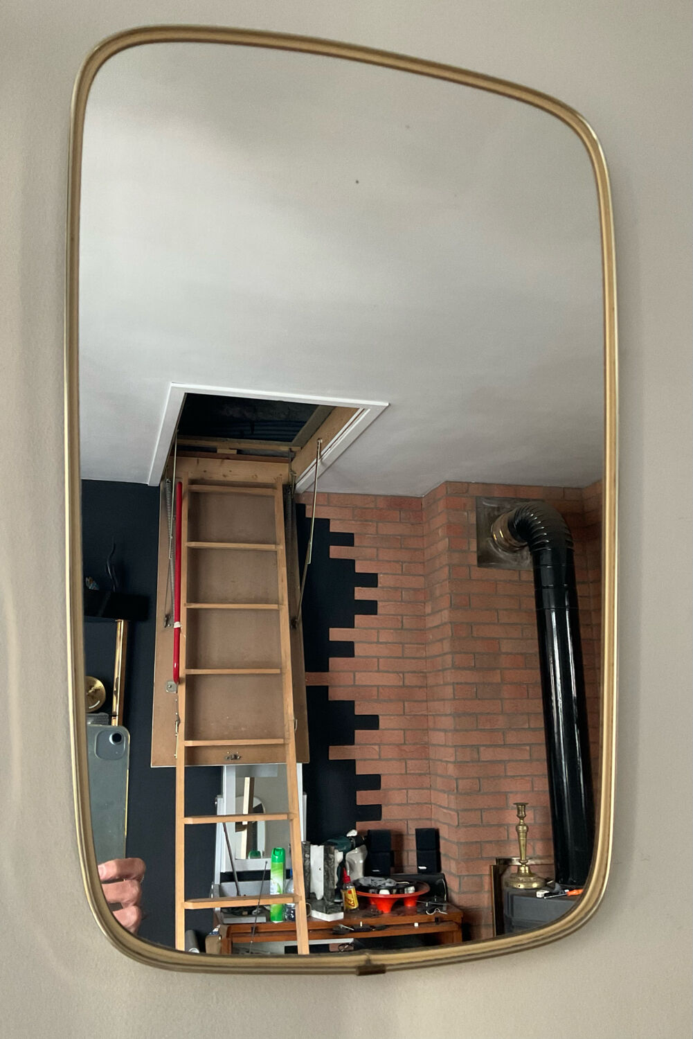 Asymmetrical free-form mirror from the 60s