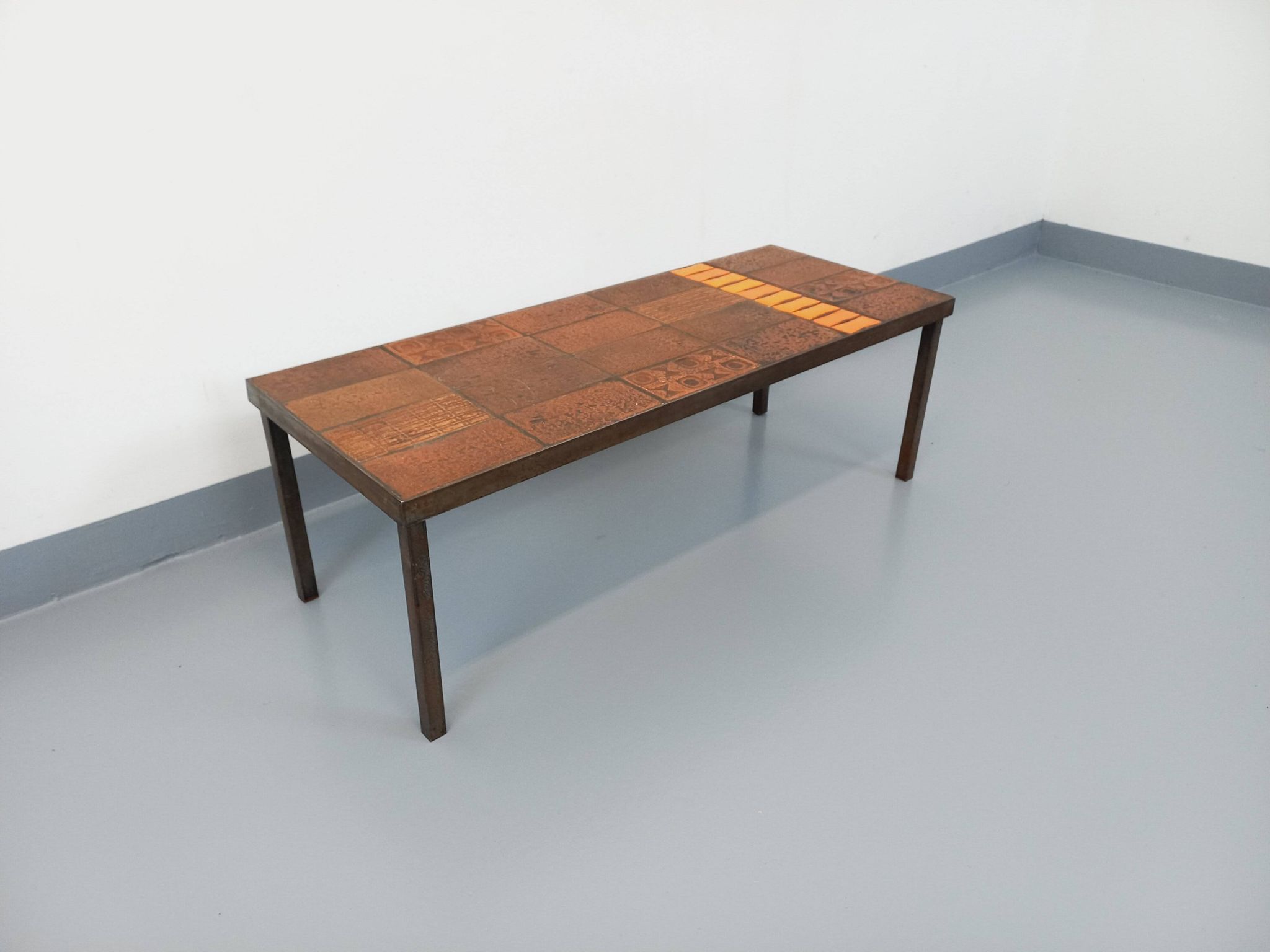 Vintage rectangular coffee table by Jean Jaffeux in steel and ceramic from the 60s
