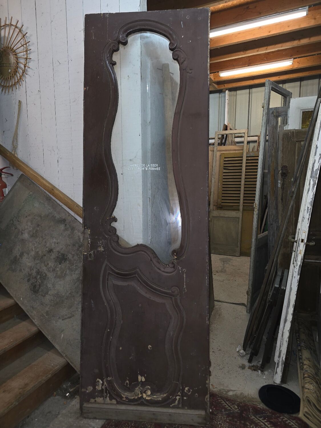 Old glass shop door in oak
