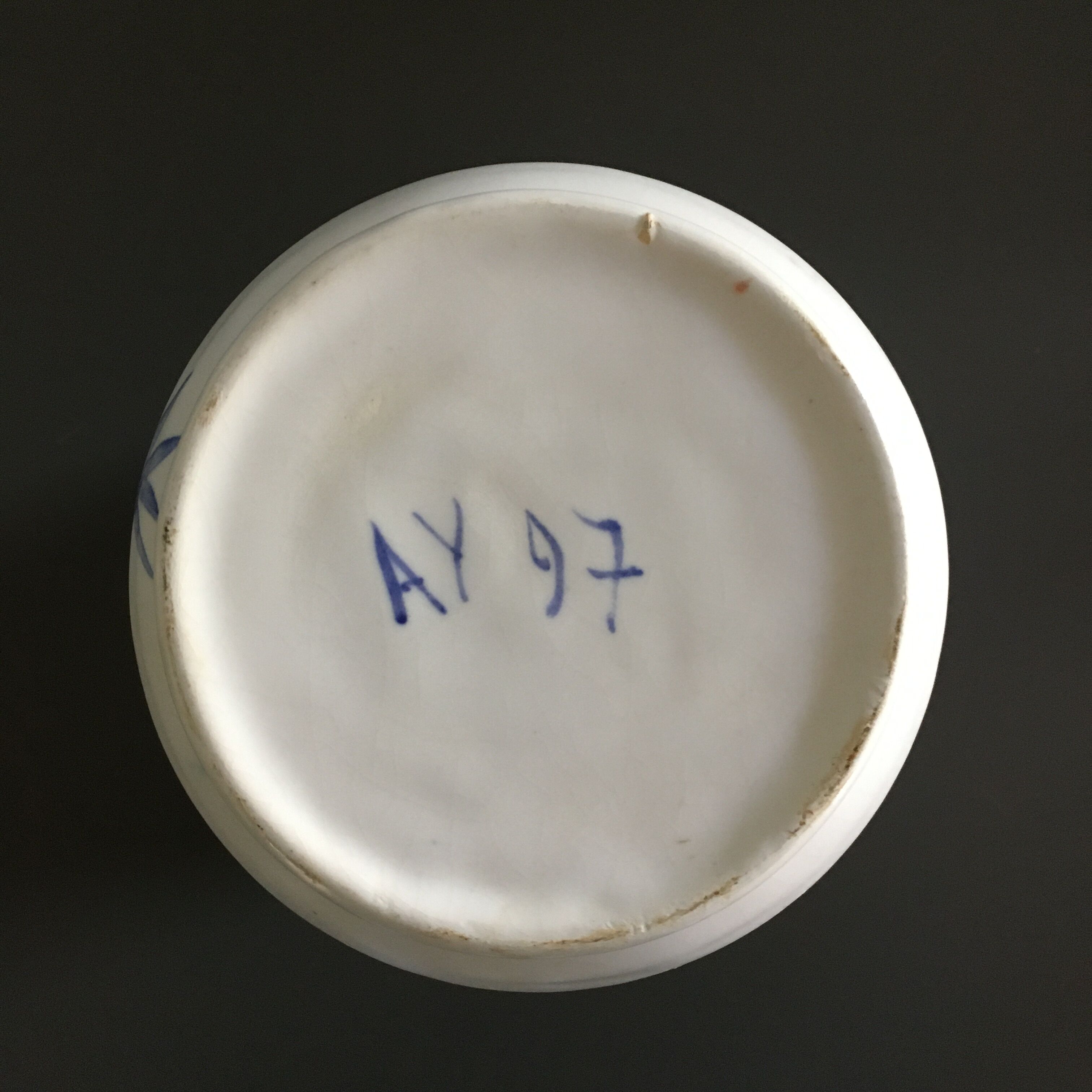 Ivory vase with blue decoration signed