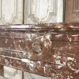 Red marble fireplace in the Louis XVI style, late 19th century