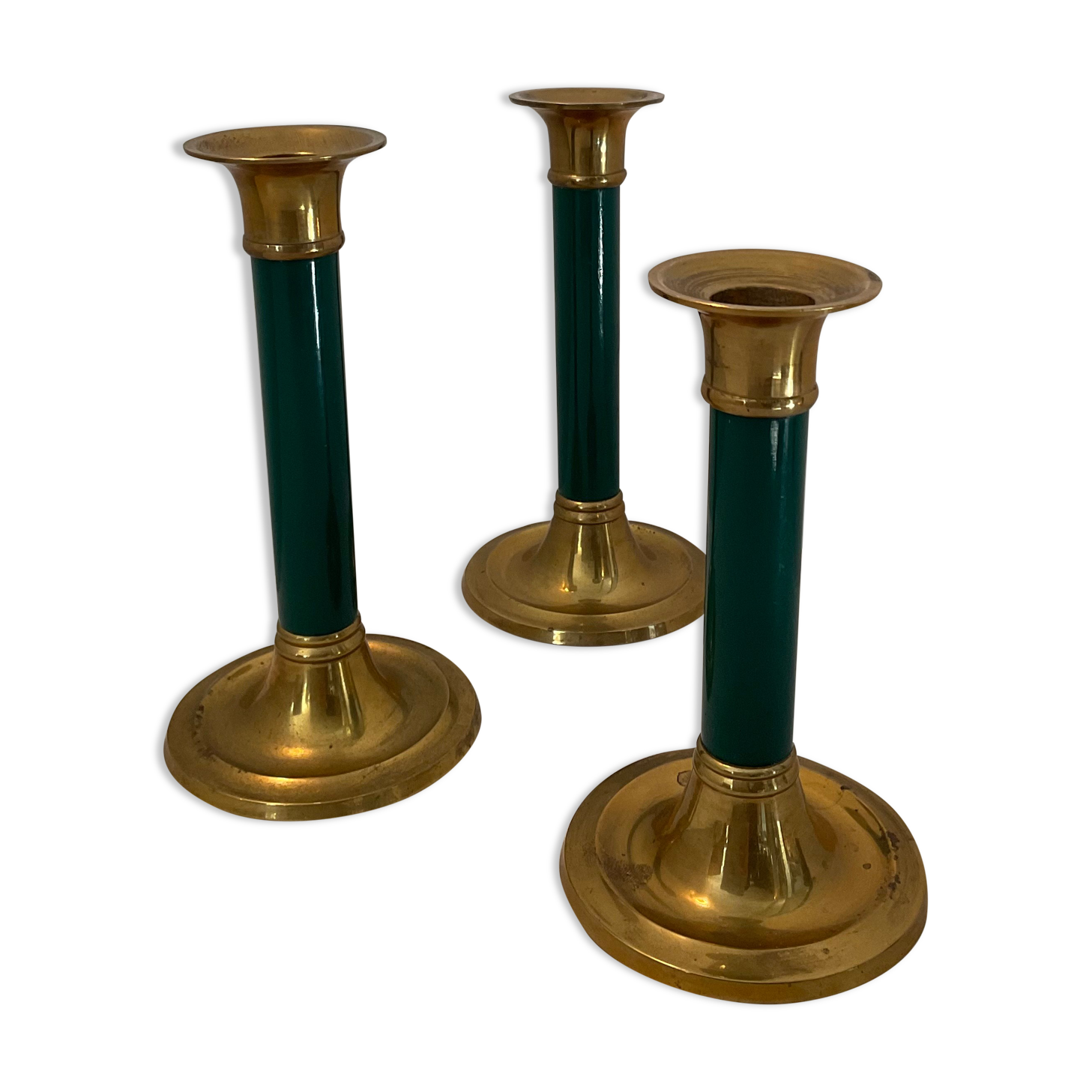 Trio of vintage bronze candle holders