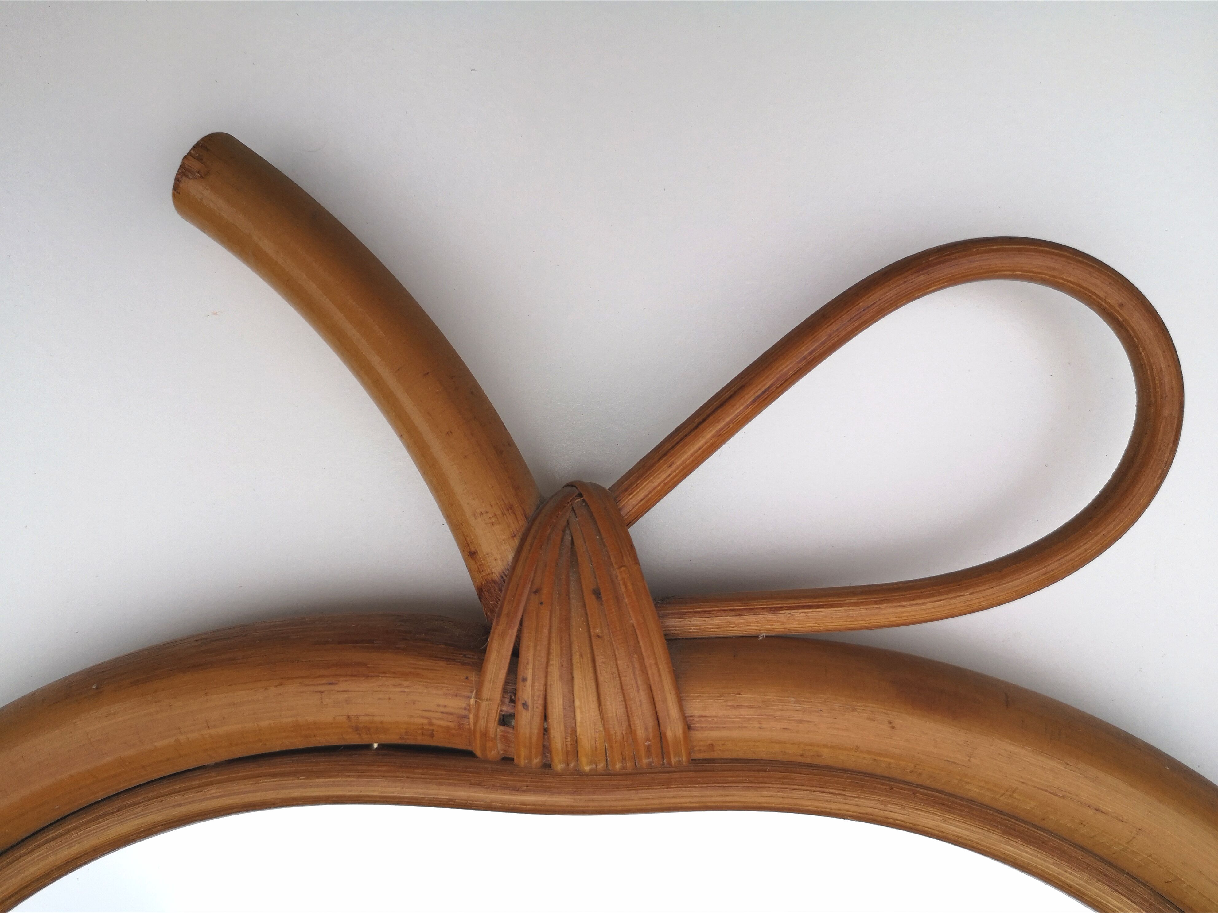 Vintage "apple" mirror in rattan
