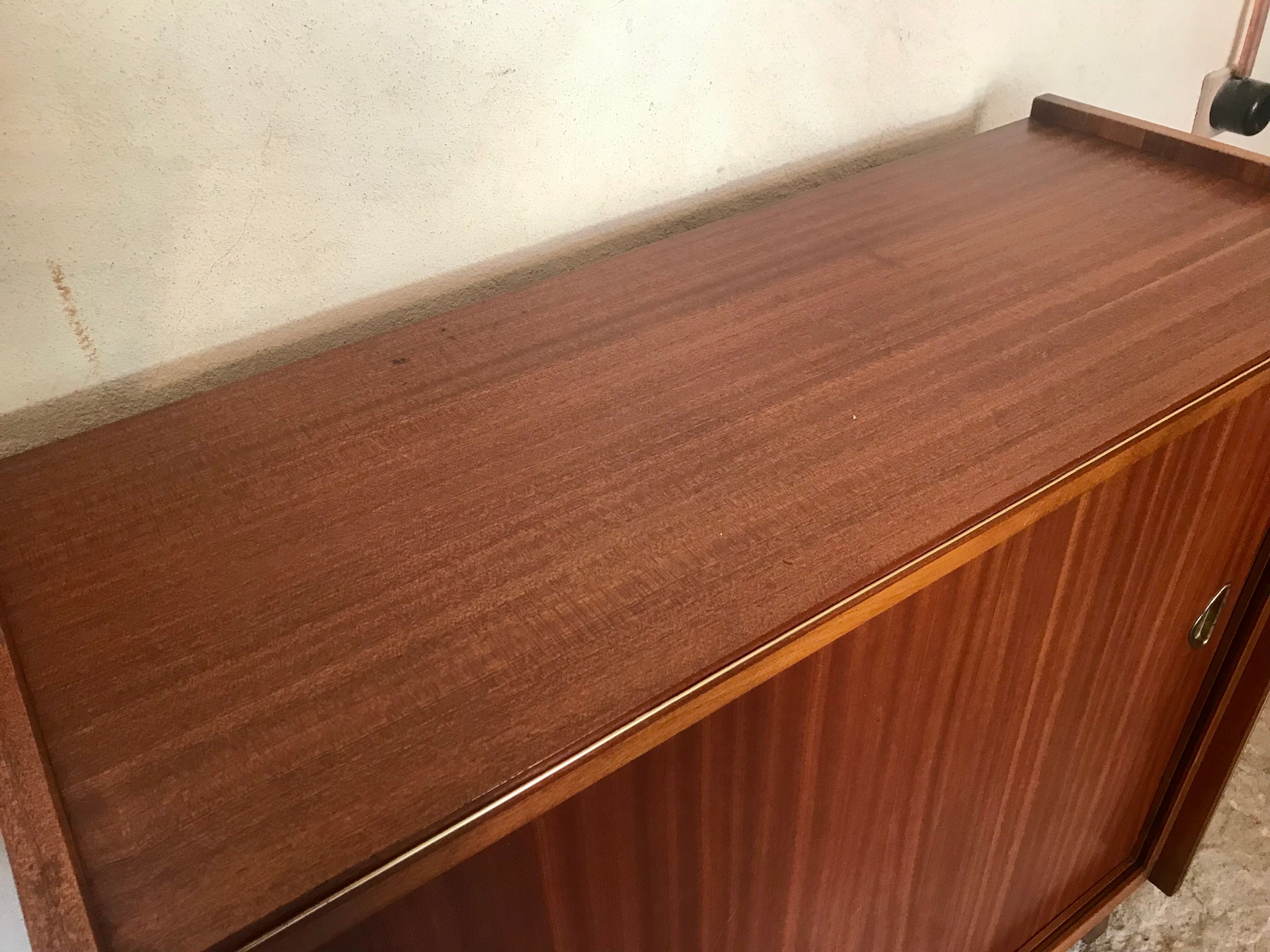 Vintage storage cabinet teak veneer sliding door compass feet