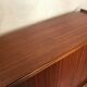 Vintage storage cabinet teak veneer sliding door compass feet