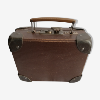 Old metal cardboard suitcase