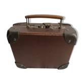 Old metal cardboard suitcase
