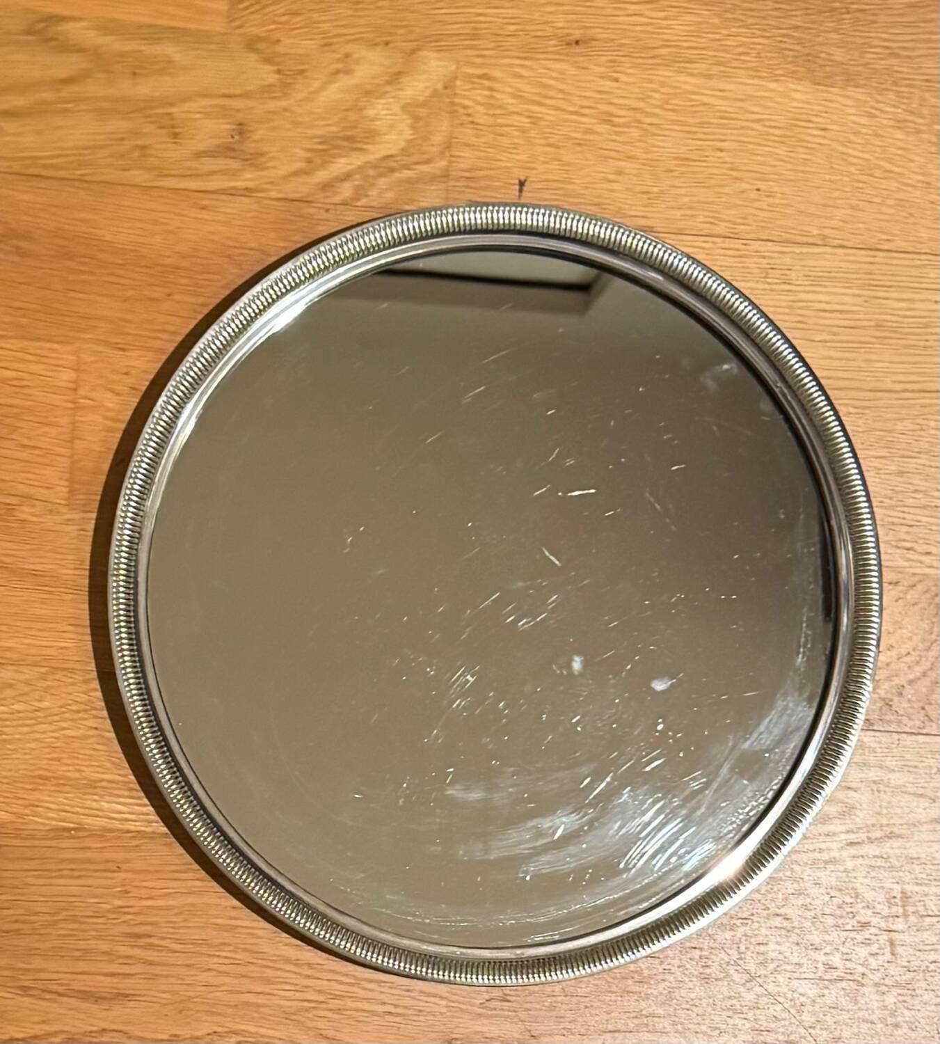 Round silver-plated metal tray and mirror
