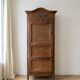 Antique bonnetière wardrobe in carved wood, Classic style.