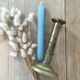 Brass pusher candle holder