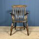 Brown English Windsor armchair with high back