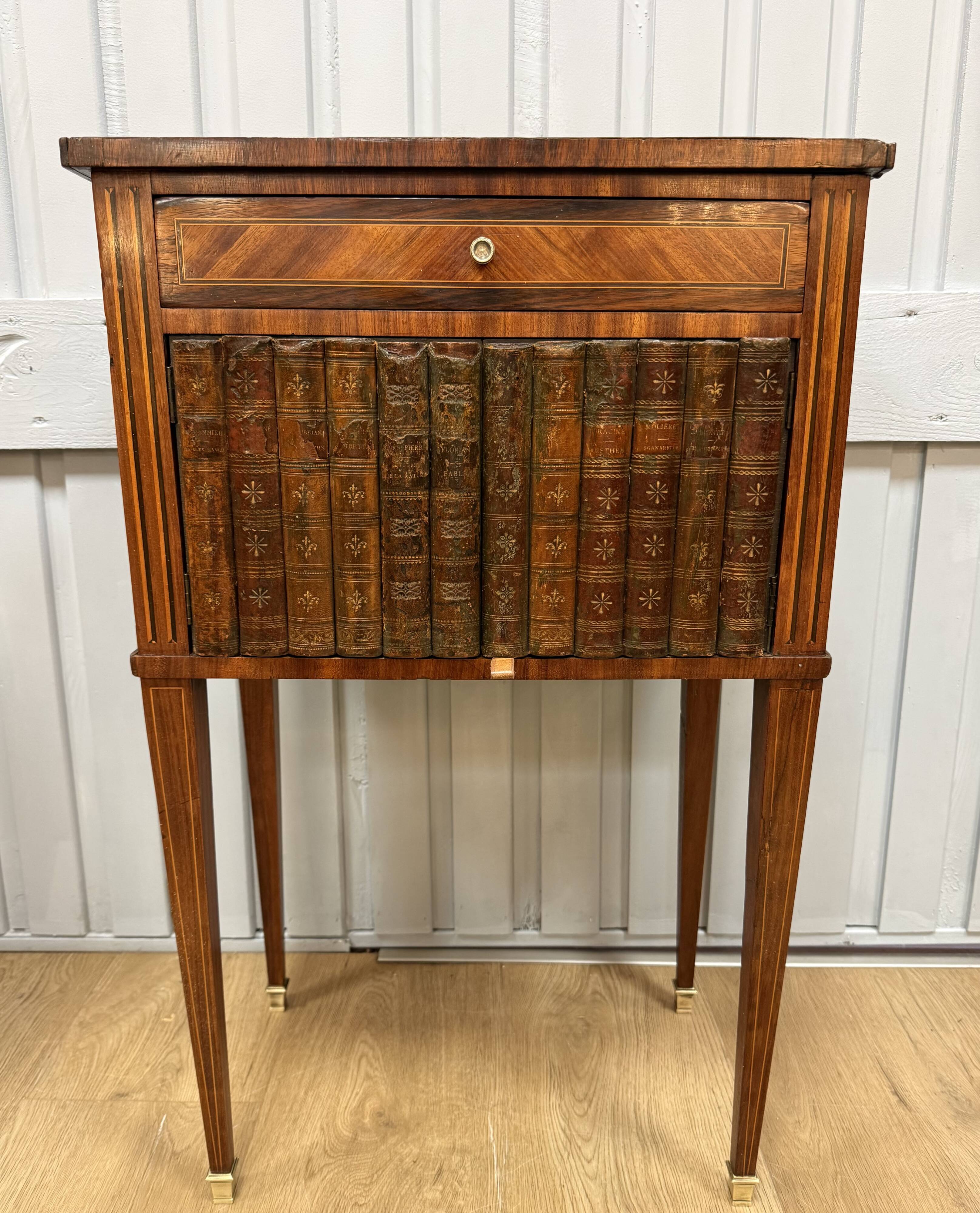 Side table with a faux book front.