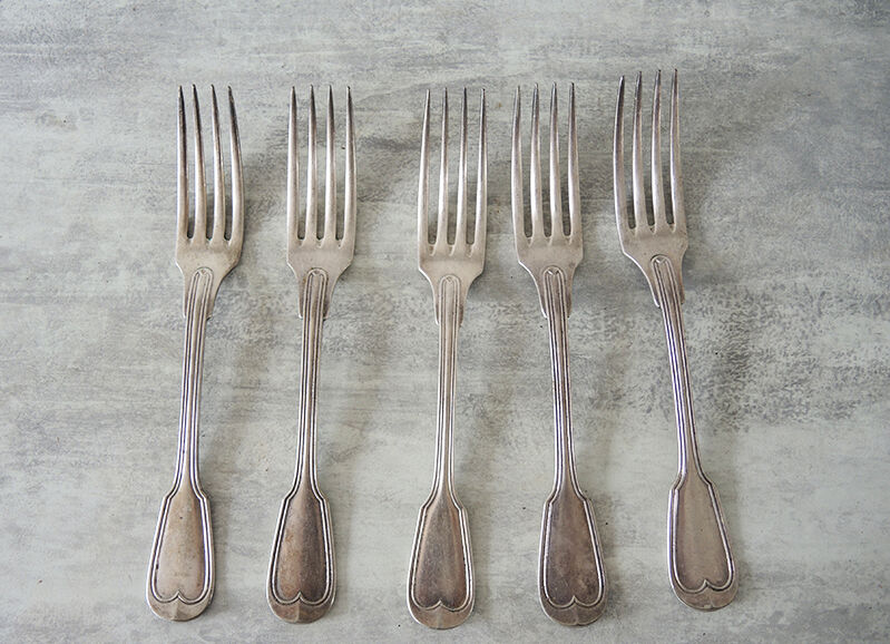 5 old table forks in silver metal