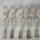 5 old table forks in silver metal