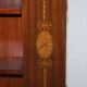 Edwardian burr walnut revolving bookcase with Sheraton inlays circa 1900