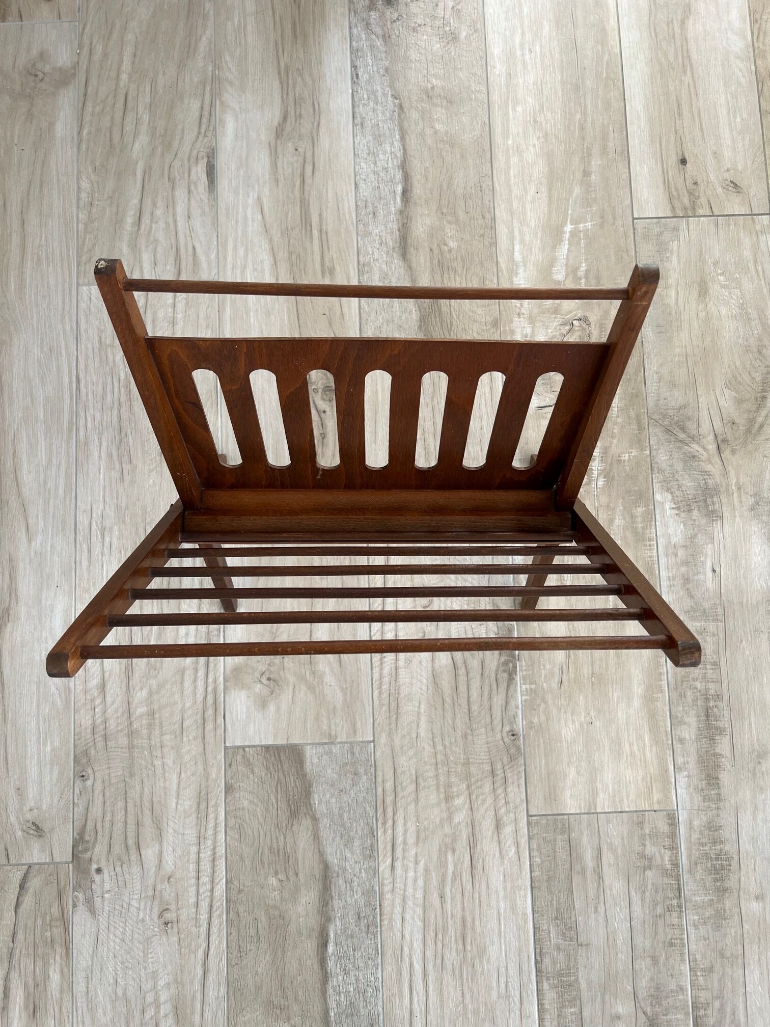 Folding magazine door