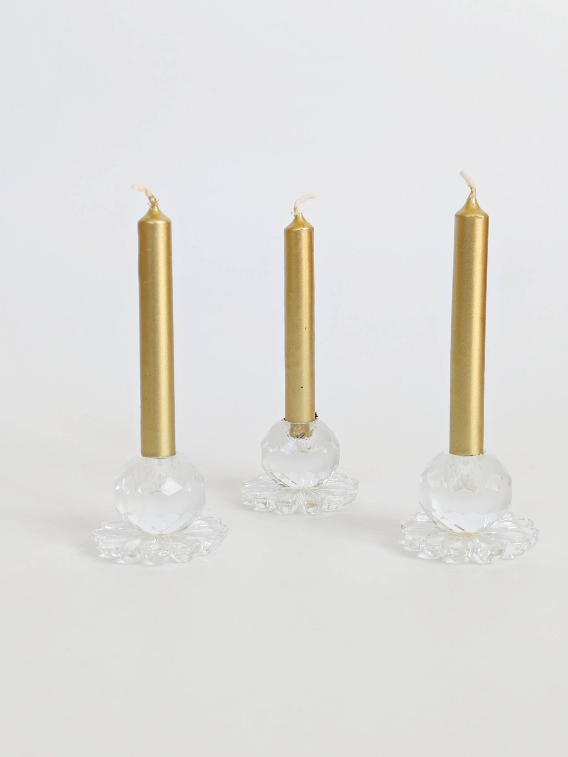Lot of 3 vintage faceted crystal candle holders with flower base for slim candles.