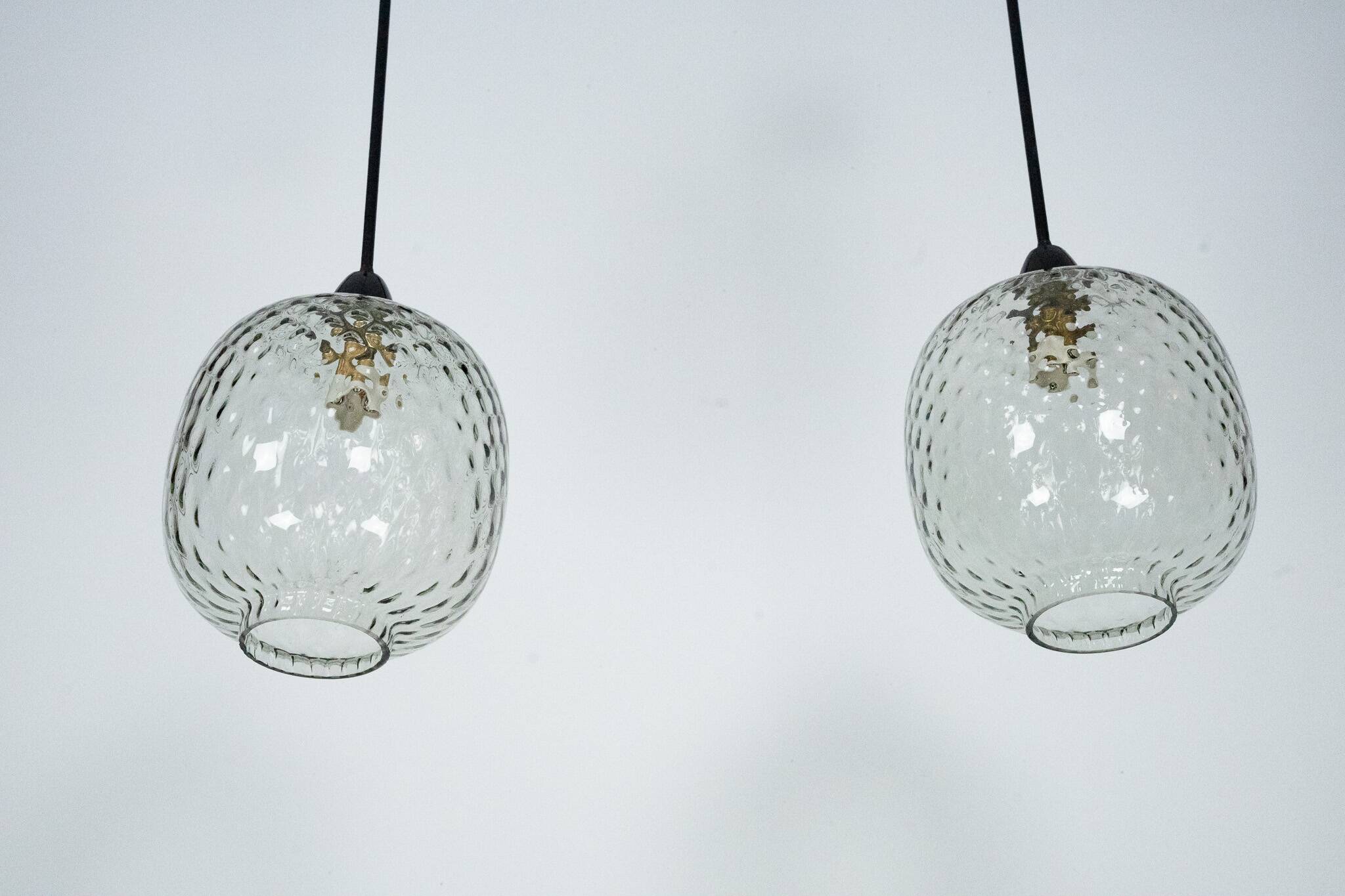 Pair of Mid-Century pendant lamps in smoked Murano glass, Italy, 1950s
