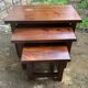 Set of 3 nesting coffee tables in oak.
