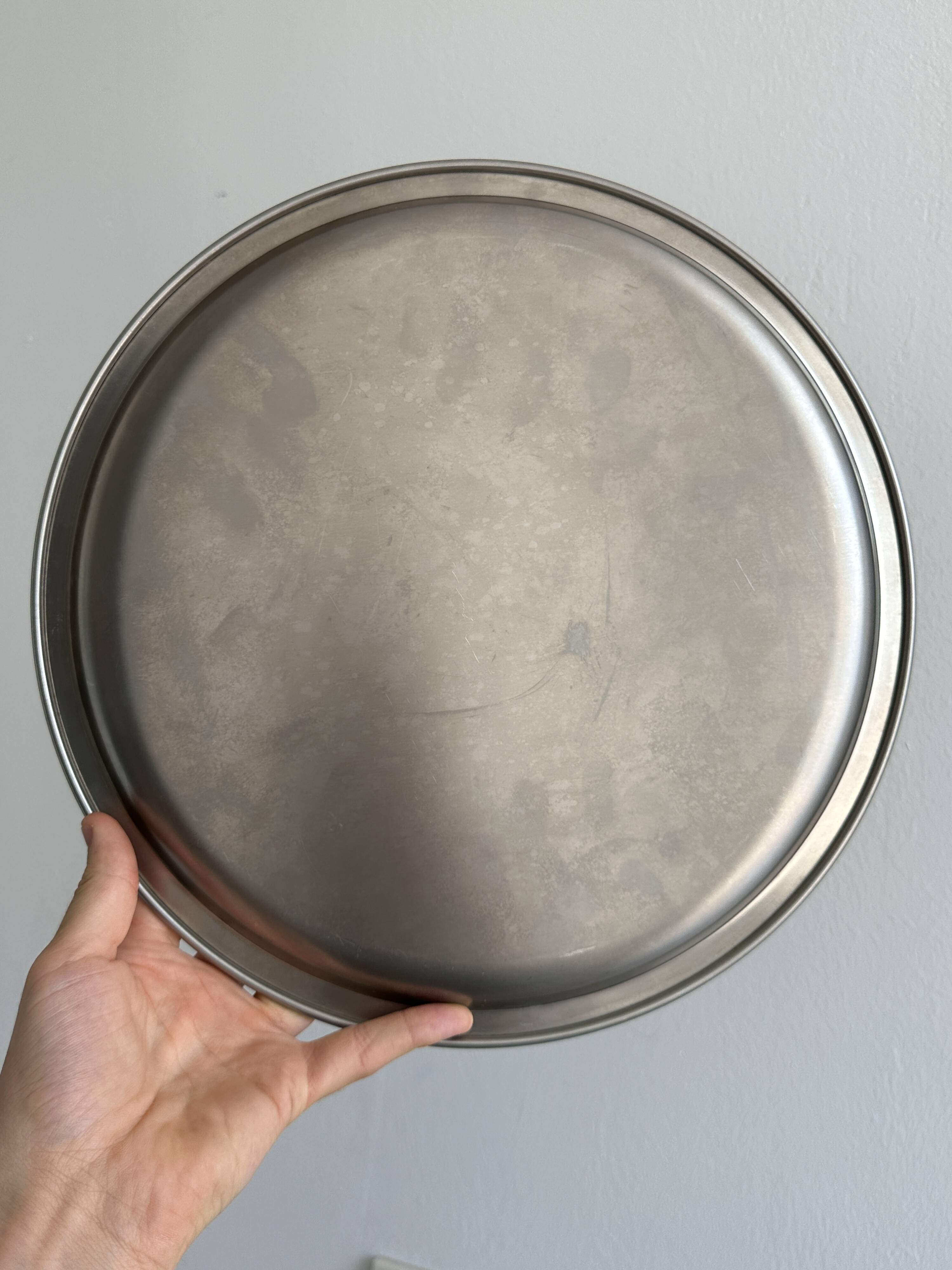 Round stainless steel tray, sleek modern design