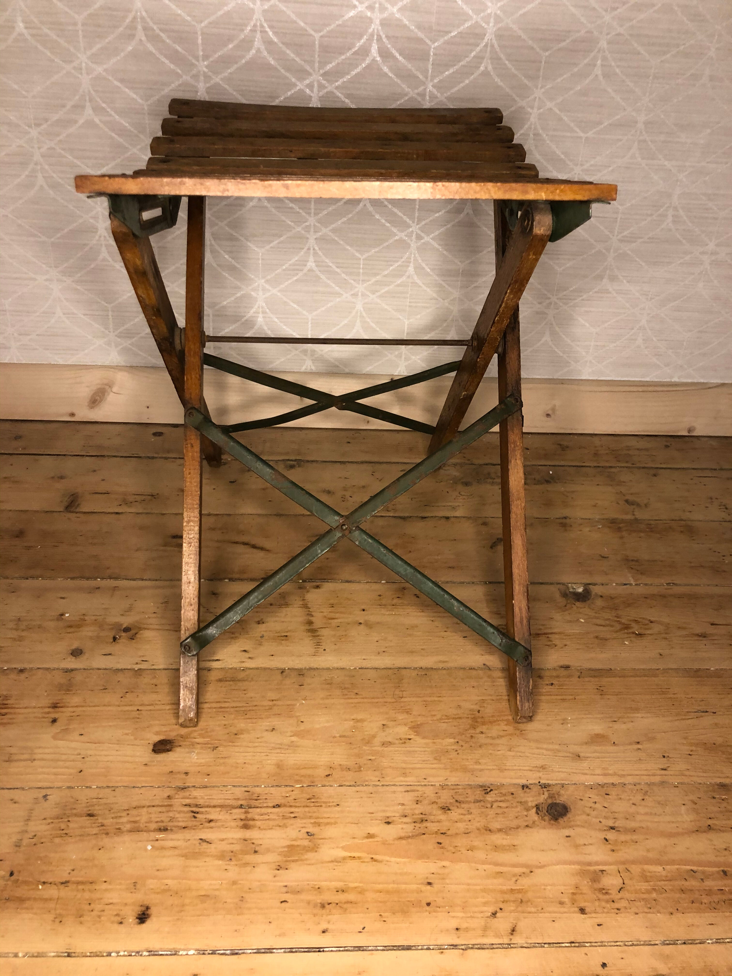 Wooden and iron slatting stool