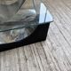 Table basse socle moulé et chrome, années 70