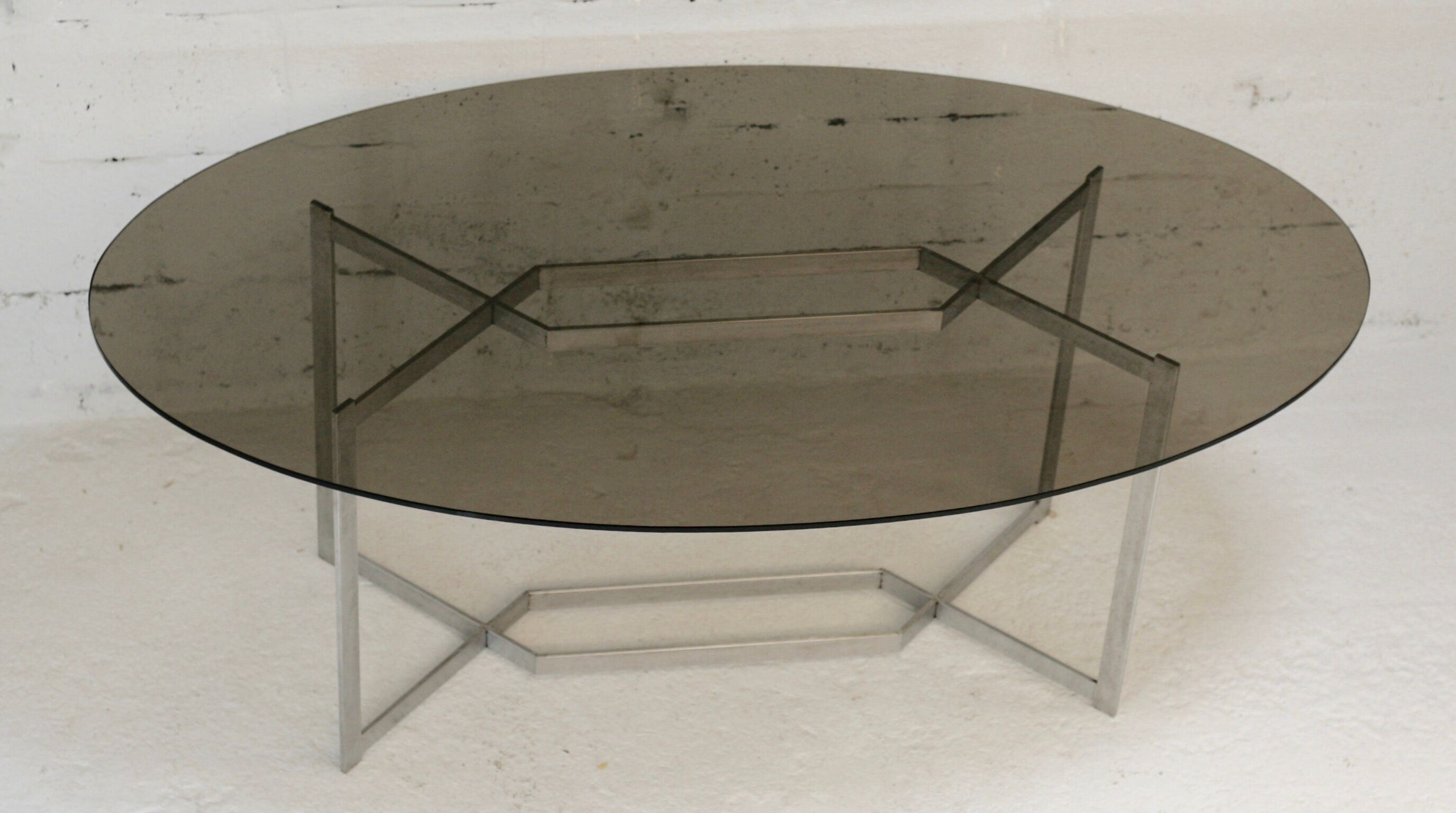 Table de Paul Legard, édition DOM, aluminium brossé et dalle elliptique de verre fumé, France, circa