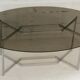 Table de Paul Legard, édition DOM, aluminium brossé et dalle elliptique de verre fumé, France, circa