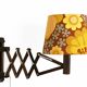 Wall lamp/scissor lamp in died pine wood from Translandia. Denmark 1960s