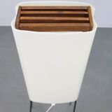 Mid-century modern floor lamp on iron legs with plastic shade and wood accent