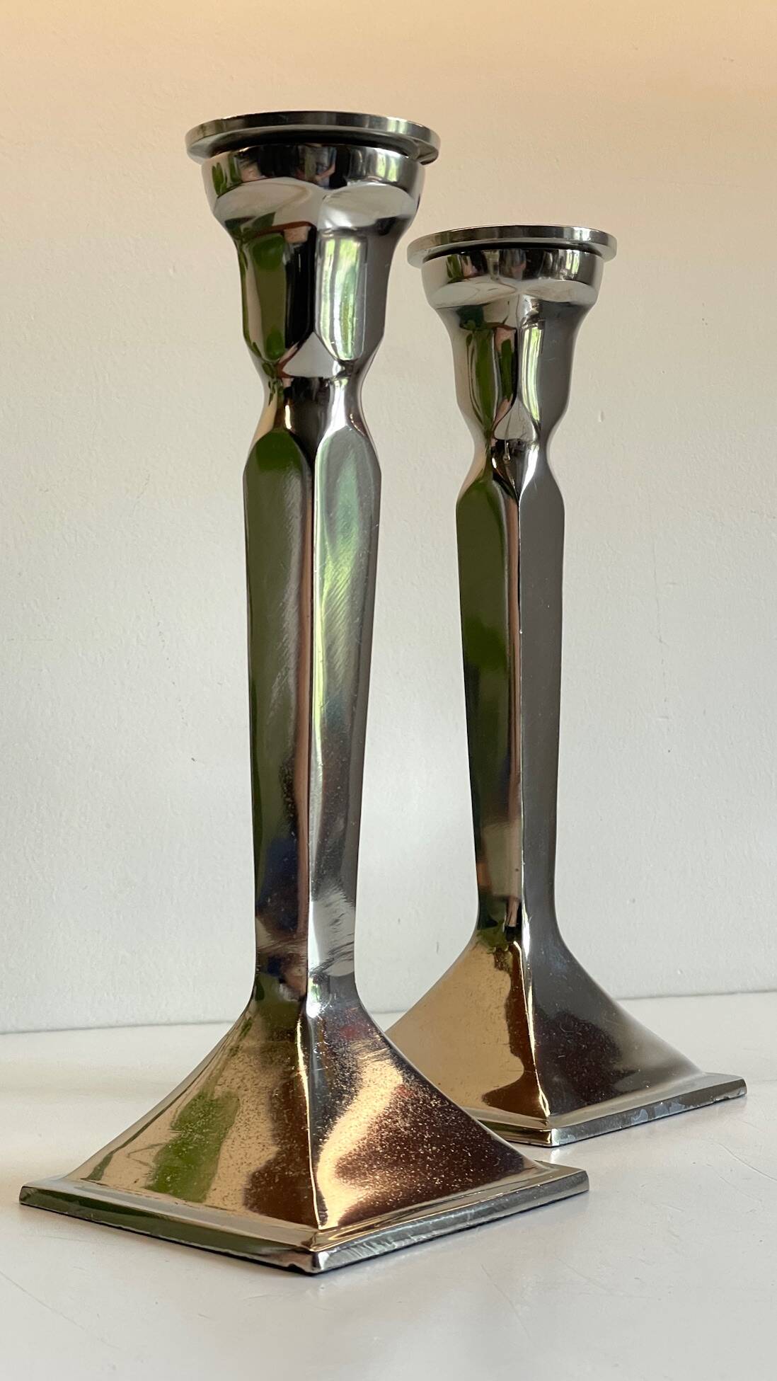Pair of vintage cast aluminum candlesticks