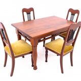 Table with four chairs from the early 20th century