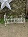 Old wrought iron doll bed